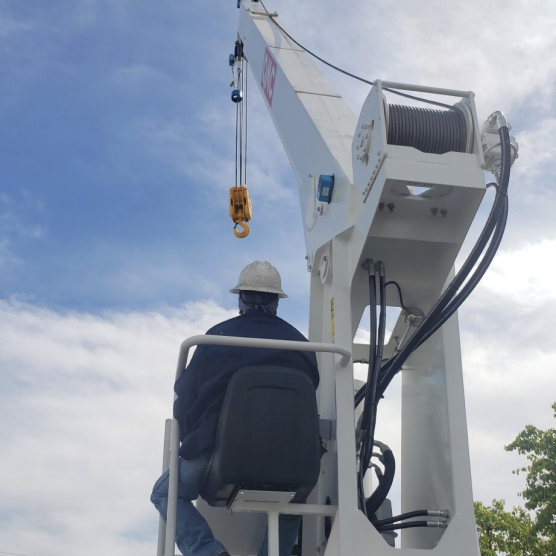 Man controlling crane